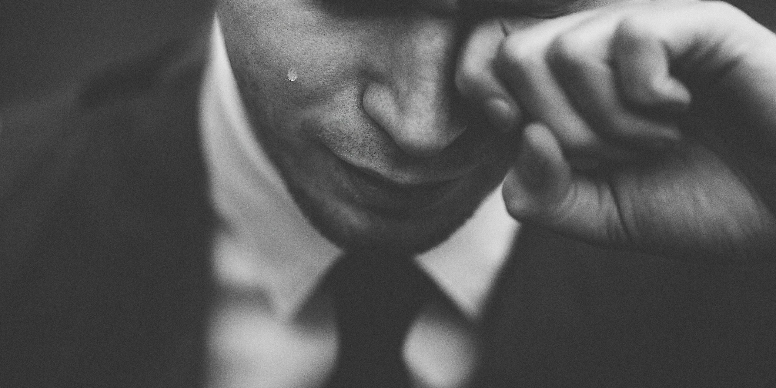 crying man crying black and white